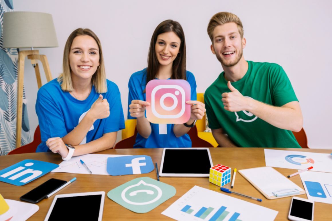 two girls in blue shirt and one boy in green shirt presenting Instagram Marketing in Nepal
